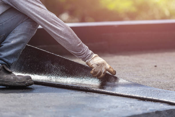 Professional Waterproofing technician working in Slinger, WI